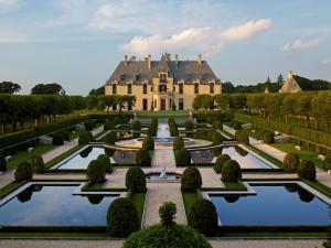 Concierge Auctions stacks $185M in luxury listings, from Gatsby castle to Caribbean beachfront